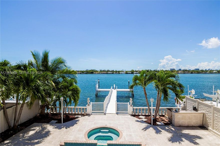Luxury Waterfront Lease Available Now! Live on a guard-gated island in coveted North Beach & enjoy unobstructed S.E. views of the wide bay & the ultimate Miami Beach boating lifestyle. With no fixed bridges to the bay & 50' of water frontage, this pool home is ideal for serious boaters seeking direct ocean access. Spanning over 3,245 sq.ft., the residence features 4 bedrooms & 4 full baths, including 3 spacious bedrooms downstairs & a large upstairs primary suite with an oversized bath & generous walk-in closet. The open gas kitchen flows seamlessly into the main living areas, creating an easy indoor-outdoor lifestyle. Enjoy a waterside pool, covered patio, & T-dock, perfect for entertaining or relaxing along the bay. Furniture is available/negotiable. 1-car garage. Located in desirable North Beach, just minutes to the beach, Bal Harbour Shops, Surfside dining, parks, & local favorites — combining privacy, convenience, & a relaxed coastal lifestyle.