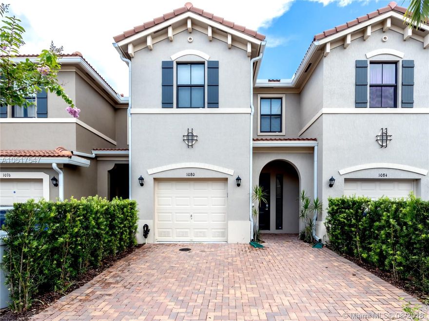 If you are looking for a move in ready home this is it! This gorgeous brand new townhouse in Madison Place features a modern kitchen for the avid chef with stainless steel appliances. quartz counter top and a center island. Fully tiled 1st floor and hurricane impact windows through out. WIFI enabled garage door opener, keyless entry with deadbolt & wired for security! Couldn't ask for a better location, close to everything.