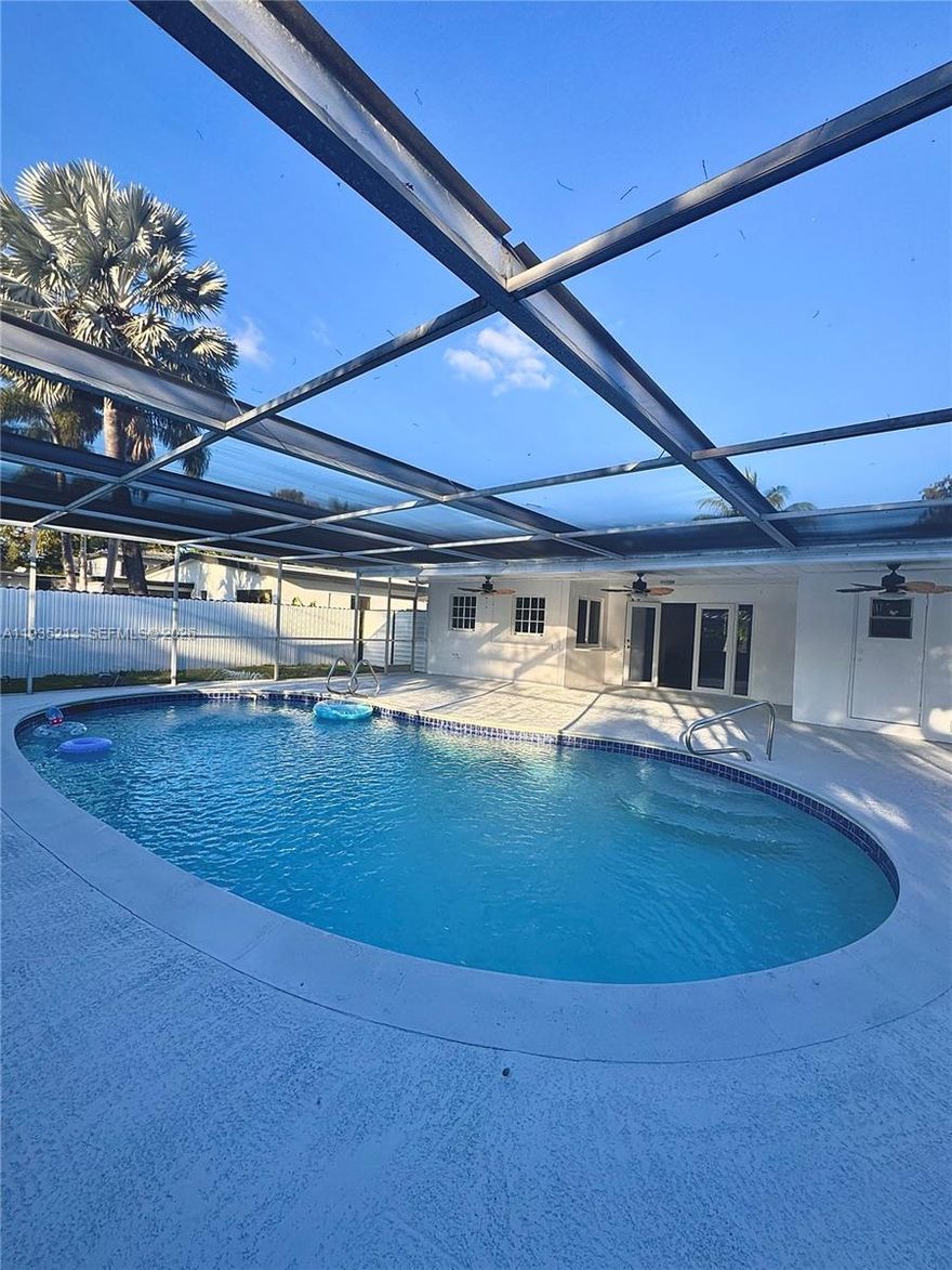 Beautiful North Miami 4 bed / 3 bath including the 1/1 in-law suite. This pool home offers backyard shed for extra storage and plenty of outdoor space for entertaining or relaxing. The privacy and versatility of having an in-law suite is beneficial for accommodating aging parents, adult children or generating rental income, extended family, a home office, or other uses. The main home offers a bright open living and dining area, updated kitchen, and well-sized bedrooms and bathrooms. Features include a screened-in pool and patio, fenced backyard, and off-street parking for multiple cars. Conveniently located close to major highways, beaches, shopping, schools, churches and parks.