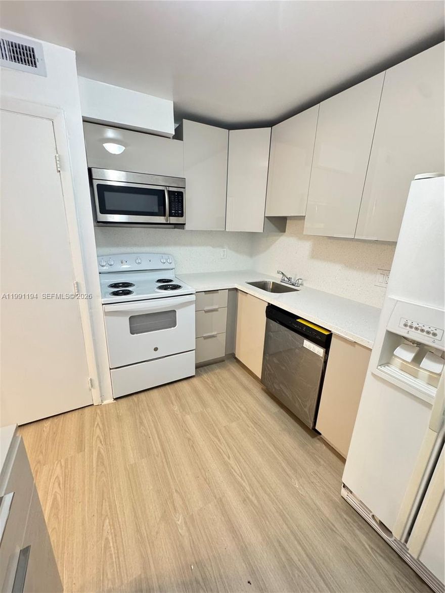Beautiful and spacious apartment located in a gated community. Features include a one-year-old kitchen and vanities, laminate wood-look flooring, and a new washer and dryer. Enjoy a balcony with a wonderful view, plus exterior parking and guest parking. Conveniently located with easy access to major highways. Water, cable, and internet are included.