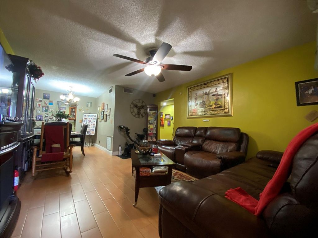 Photo of 2412 NW 39th Way #101, Lauderdale Lakes, FL 33311 (MLS # A11947891)