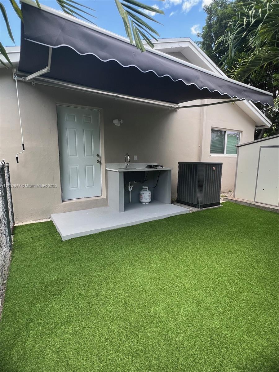 A RARE GEM-DON'T MISS OUT! Step into this stunning, fully remodeled and painted efficiency with brand-new appliances. Featuring 1 bedroom, 1 full bathroom, outside kitchen-sink, patio, private entrance, adjustable AC, large fridge, microwave and parking for 2 vehicles. Nestled in a quiet and family-friendly neighborhood, this property provides easy access to major highways like the Florida Turnpike and 836, and important routes such as 137th Ave, 40th and 8th Streets. You will also find a wide selection of restaurants, supermarkets and shopping centers just minutes away. Wi-Fi, electricity, and water included in the rent. Unit is ideally suited for one occupant. PRICE ASKED IS FOR 1 PERSON. If two occupants, rent will be $1,800/month. Ready for immediate occupancy. Pets are not allowed.