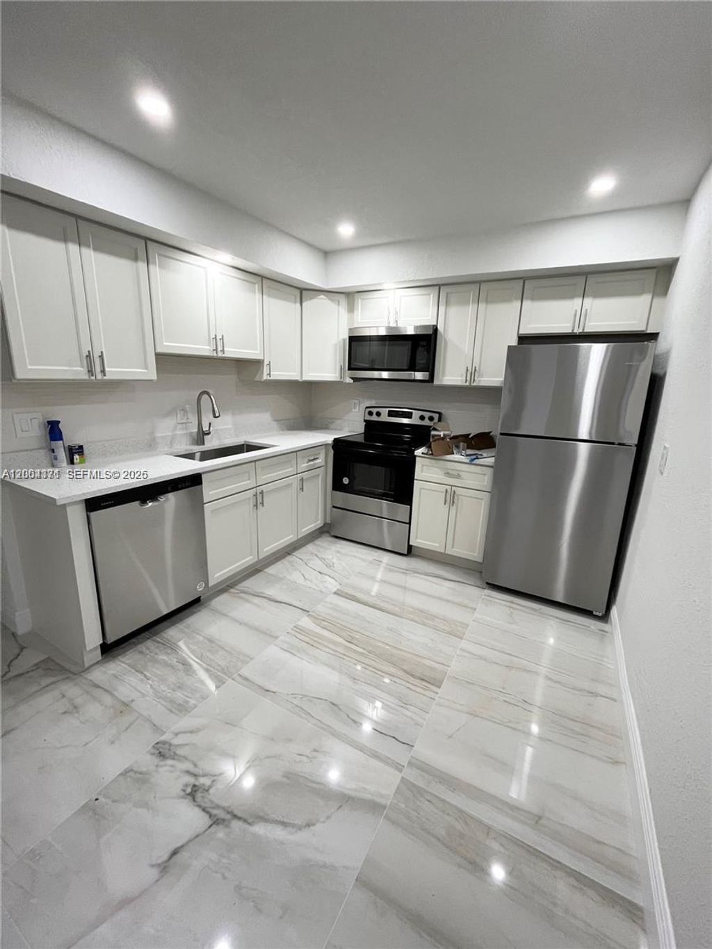 Photo of 8011 NW 44th Ct #1, Coral Springs, FL 33065 (MLS # A12004371)