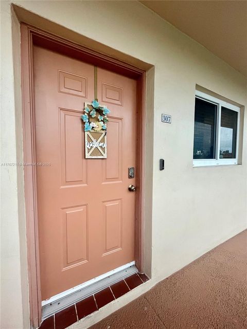Photo of 5945 Del Lago Cir #307, Sunrise, FL 33313 (MLS # A11767211)