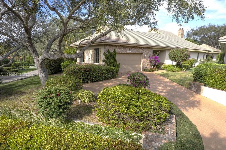 Experience the coveted Jupiter Hills Village lifestyle in this fully furnished 3BR 3.5BTH home perched on an elevated corner lot.  Privacy at its best with a stand alone guest cottage overlooking terrace gardens.  A dramatic living-dining-media room room features a cozy fireplace and wet bar.  While the chef's eat-in-kitchen offers a breakfast nook and oversized pantry.  The primary suite enjoys a sitting area, spa-style bath and custom closets. A second ensuite bedroom is in the main home, and the cottage welcomes guests with its supreme privacy.  Two expansive terraces with lush gardens for seamless indoor-outdoor entertaining.  Recent upgrades include new A/C, water heater, roof and refreshed kitchen and baths.  Oversized 2 car garage and long paver driveway providing ample guest parking.  Ready to move in, bring your clubs and enjoy!