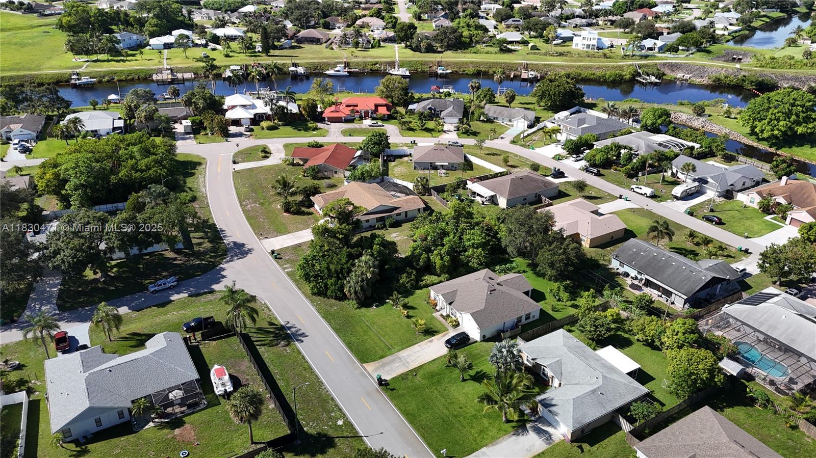 Exclusively Presented by Sunland Real Estate: Last lot in this riverfront neighborhood. Build on this .23 acre lot in a great neighborhood and in a very convenient location right off of Port St Lucie Blvd, with access to the Florida Turnpike. The lot is in the center of Port St. Lucie. This lot is in a non flood zone so it is high and dry with no need to have flood insurance. Ready to be built on.