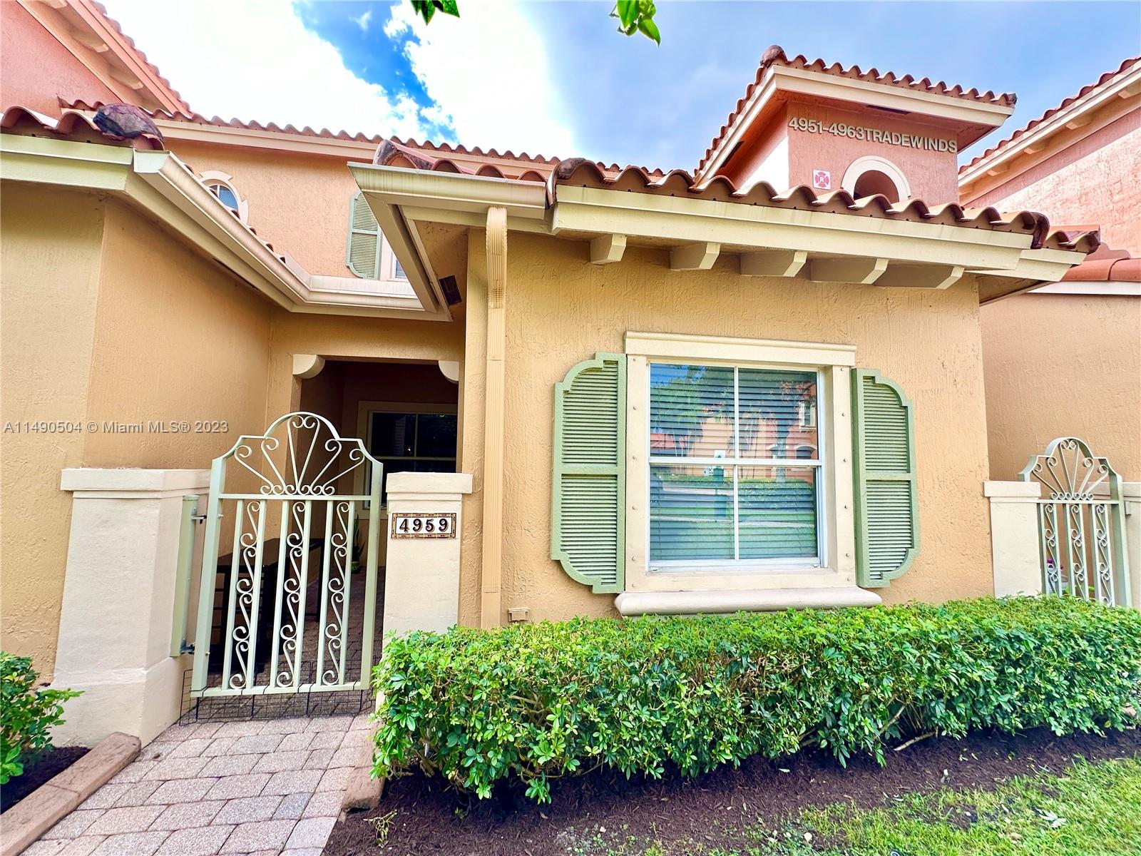 Incredible water view investment opportunity Rented for $2,600 to a fantastic long-term tenant.Tenant agree to leave with 30 days notice in the event buyer wants to occupy the property.New A/C in and new water heater.This Mediterranean townhome blends classic charm with modern luxury.3 full bedrooms with 3 full bathrooms A culinary delight, the kitchen boasts rich wooden cabinetry.Upstairs, a luxurious master bedrooms,with a bath featuring a deep soaking tub,glass-enclosed shower,and vanities.Three bedrooms provide ample space, each with unique details and closet space.The outdoor patio is perfect for relaxation,whether al fresco dining , morning coffees,or simple unwinding. Lush landscaping envelops the home, ensuring natural beauty and privacy
