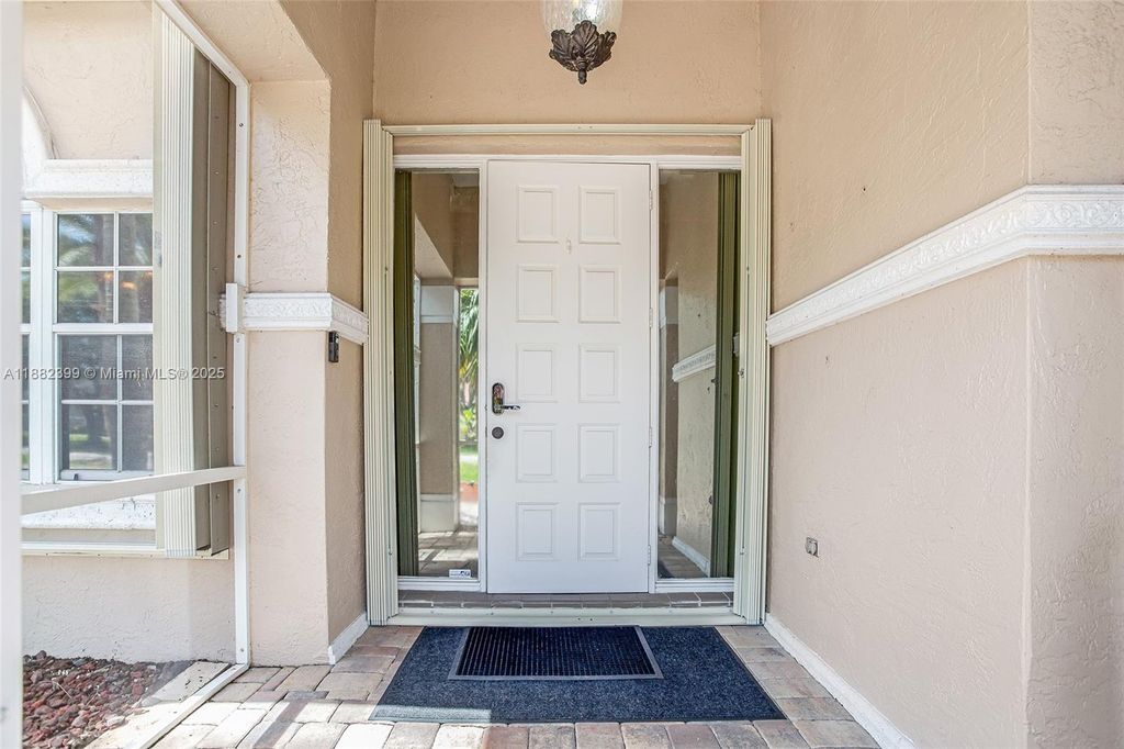 Photo of 5911 SW 199th Ave, Pembroke Pines, FL 33332 (MLS # A11882399)