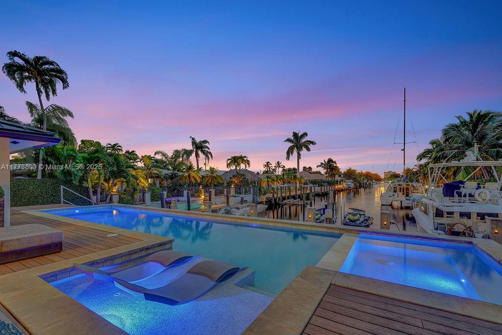 Experience coastal luxury in this fully renovated 3-bedroom + an office/den, 3 bathroom home in the gated Bel Air Isle community of Lauderdale by the Sea, across the street from the beach. This waterfront gem offers 80 feet of dockage for boating, paddle boarding, and kayaking, with easy ocean access. The home boasts seamless indooroutdoor living with a pool, hot tub, and expansive patio overlooking the Intracoastal for stunning sunset views. Inside, two primary en suites, high-end finishes, impact windows, a new roof, generator, and pristine landscaping complete the package. Ideally situated close to waterfront restaurants, shopping, and vibrant entertainment, this property offers the perfect blend of luxury, convenience, and South Florida living.