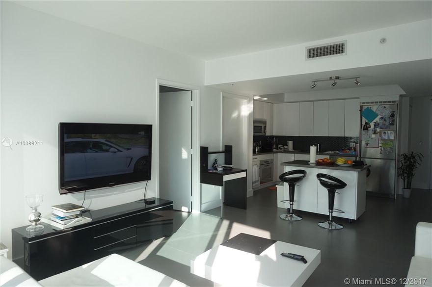 Beautiful 2/2 Unit, Italian Kitchen, granite countertops and stainless steel appliances.  Amazing view of Brickell skyline and Miami River.  Gated community, it has convenience store, Dry Cleaners, restaurant, spa, playgrounds.  Five star amenities, 24 hour Valet/concierge, Nice Spa, Steam Room, Gym & Pool.  Mezzanine is a business center which offers newspaper, apple computers, meeting tables.  This building offers Brickell Living without the traffic, very easy access to I-95 ad N. Miami Ave, gated community, minus to Brickell and Brickell City Centre, 10 to 15 min to Design District, Wynwood, Coral Gables and Coconut Grove.