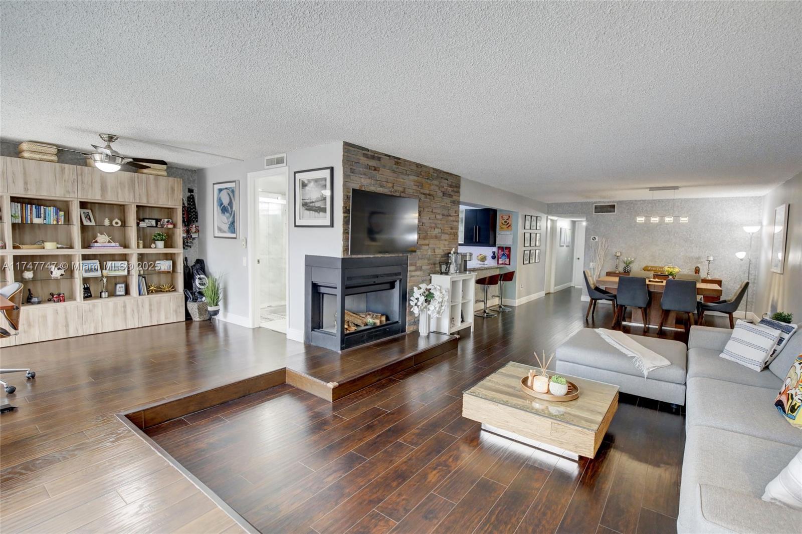 Stunning completely remodeled townhome in Snapper Village! Picturesque floor to ceiling windows let in tons of natural light to the main living space, which features an open concept with dining/living and chefs kitchen with granite countertops and stainless steel appliances. Oversized primary suite with direct access to the private backyard, dream walk-in closet, and huge spa-like primary bathroom with double sinks and an oversized steam shower! This townhome is originally a 3 bedroom, but the third bedroom has been opened and is used as a modern open air office space that can easily be converted back with an in-suite bathroom. HOA fees cover exterior maintenance and insurance, reserves, cable, internet, and water. HOA has oversized pool and party area, and 24 hour guard entry.