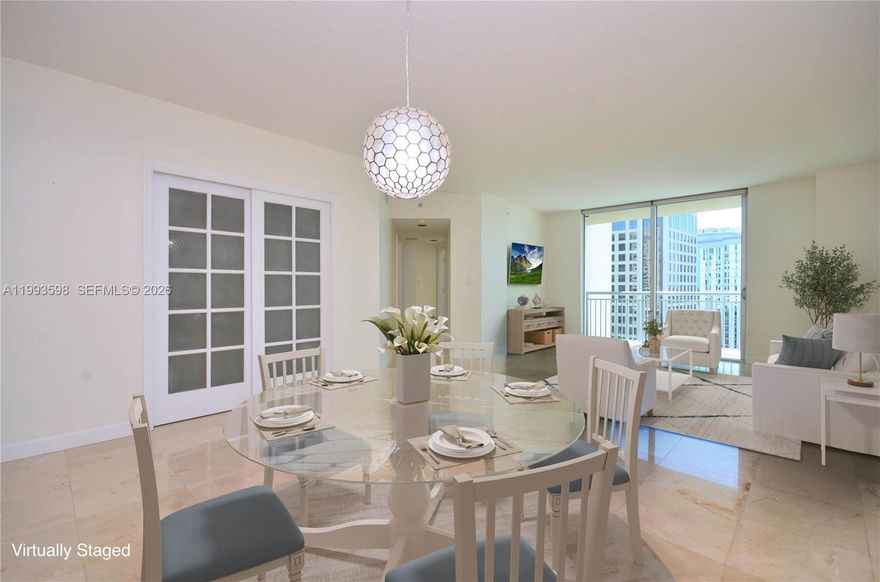 Two assigned parking spaces included! This beautiful and spacious 2Bedroom + Den / 2Bath corner unit in Downtown Dadeland is only steps away from Publix, Dadeland Mall, Dadeland Station, Metrorail, and world-class dining, shopping, and entertainment! US1, 826, 878, Pinecrest, South Miami, and Baptist Hospital are all nearby. The 1,350 SF bright and open layout features polished marble floors, large bedrooms with walk-in closets, spacious bathrooms, new central ac, modern kitchen with SS appliances and granite countertops, washer and dryer, high-impact windows with expansive city views, and a large open balcony to enjoy the sunsets and Florida’s beautiful weather. The den serves as a perfect guest room, home office, gym, etc. The Metropolis complex offers luxurious, full service 24/7 concierge, 24/7 valet parking, 24/7 security patrol, state-of-the-art gym, cardio fitness center, sauna, two pools, jacuzzi, and resident lounge. Easy to show on electronic lockbox! A must see!