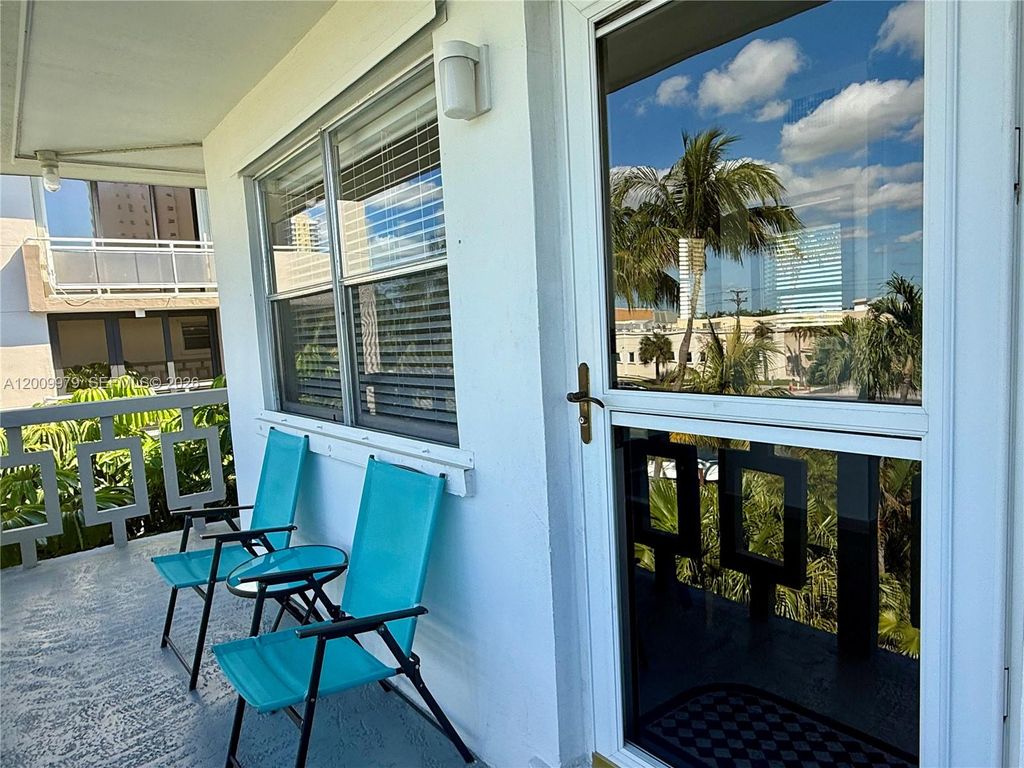 Photo of 467 Golden Isles Dr #310, Hallandale Beach, FL 33009 (MLS # A12009979)