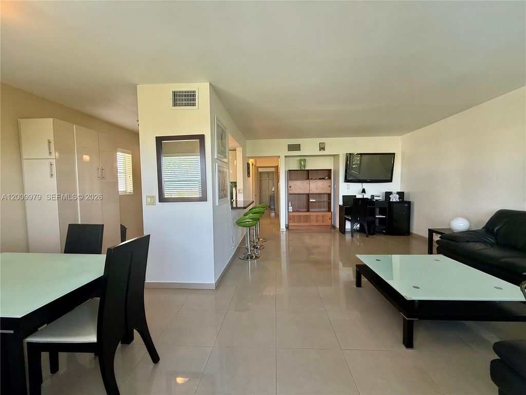 Photo of 467 Golden Isles Dr #310, Hallandale Beach, FL 33009 (MLS # A12009979)