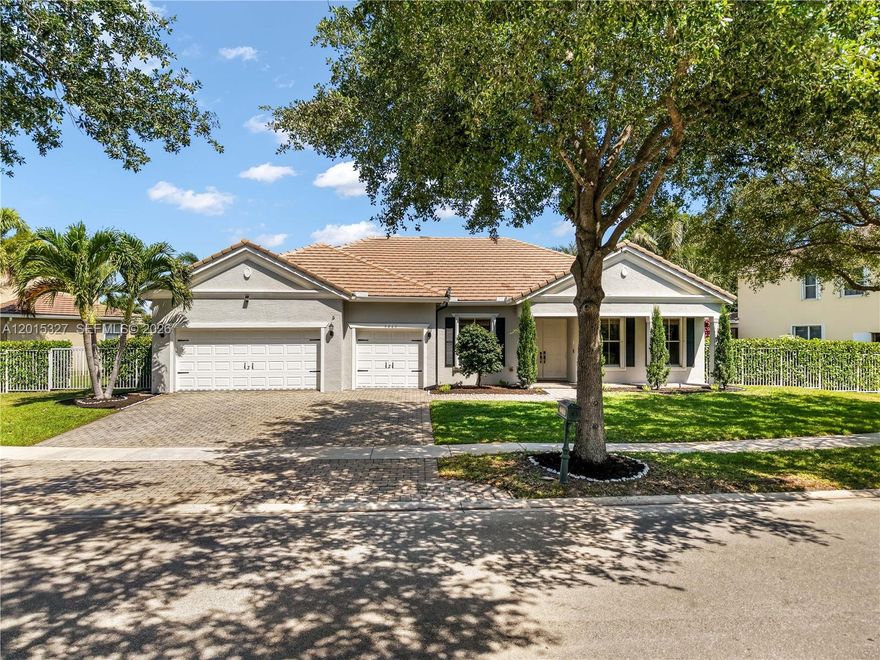 Welcome to this beautifully renovated lakefront pool home in the highly desirable Savannah Estates. This resort-style one-story home offers 4 bedrooms, 2.5 baths, and an oversized 3-car garage on one of the community’s largest pie-shaped lakefront lots. Double front doors open to soaring ceilings, abundant natural light, and stunning views of the tropical backyard, heated saltwater pool, spa, and tranquil lake. Designed for both everyday living and entertaining, the spacious floor plan features separate living and family rooms, a formal dining room, and an open kitchen with 42” white cabinetry, granite countertops, neutral finishes, and newer appliances. The split-bedroom layout provides added privacy, with the expansive primary suite offering tray ceilings, oversized walk-in closets, soaking tub and separate shower.. Additional features include neutral tile flooring, a 2024 A/C, newer dishwasher and water heater, ample attic and storage space, a covered front porch and patio, full storm protection, and an extra-wide paver driveway with parking for up to 9 vehicles. Enjoy breathtaking sunset views from the fenced lakefront backyard with a spacious paver pool deck, pool, and spa. Appreciate the added privacy and green space with no neighbors directly across the street. Community amenities include a resort-style pool and playground. Conveniently located near schools, shopping, dining, nature activities & beautiful beaches. Move-in ready and easy to show.
