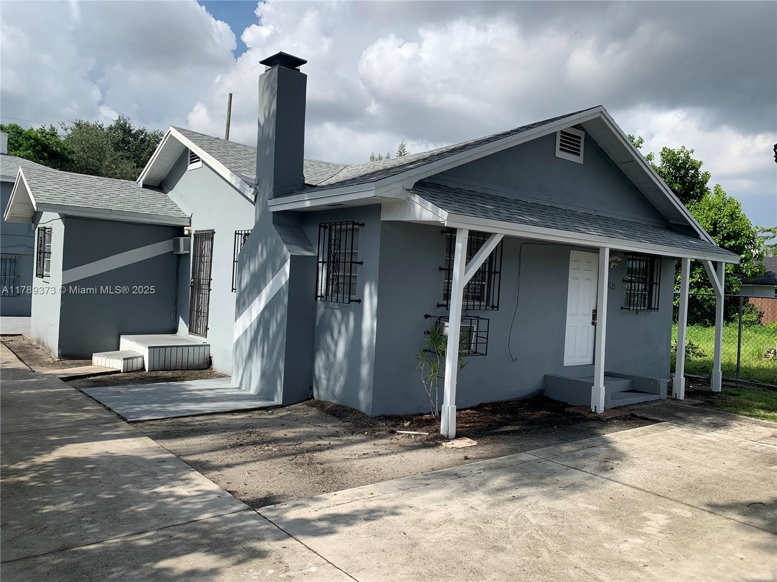 Nice triplex in great location close to Highway, Wynwood, Beach, Downtown Miami, and Airport. This is Great rental investment or purchase your primary residence and lease out both back detached units. Property is fully rented and will make you money on day 1 or can be vacant at closing. Equal Housing Opportunity.