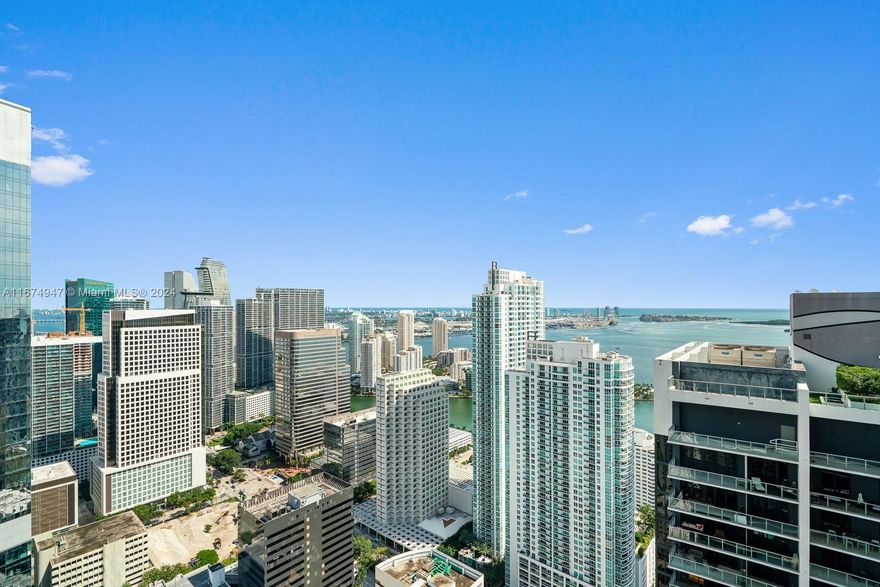 Perched high above Miami’s skyline sits PH5308 @ Flatiron, Brickell’s most desirable address. Clearing all adjacent buildings, PH5308 boasts rare EAST water views + privacy from its TWO expansive, wraparound balconies totaling 518sf. Known for its high-end finishes, this corner unit’s 10FT ceilings & natural light are perfect for entertaining w/10 windows surrounding the living area. Primary suite offers its own balcony, 2 closets & an oversized bath w/separate shower, tub & WC. Each suite has floor-to-ceiling windows w/access to balconies + en-suite bath. Miele appliances, Snaidero cabinetry. Rooftop pool w/towel service, fitness center w/yoga & pilates, spa + steam/sauna, doorman service, kid’s room, theatre & lap pool. Steps to everything Brickell has to offer. 2 parking spcs + valet.