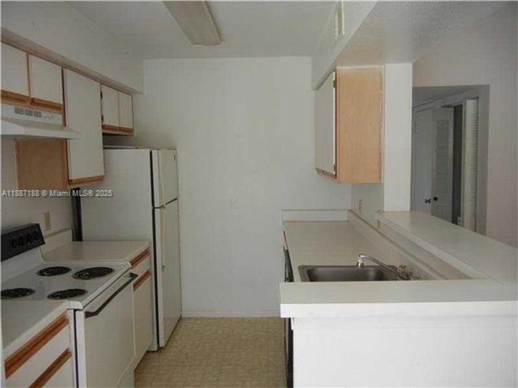 Photo of 2405 NW 33rd St #1214, Oakland Park, FL 33309 (MLS # A11887188)