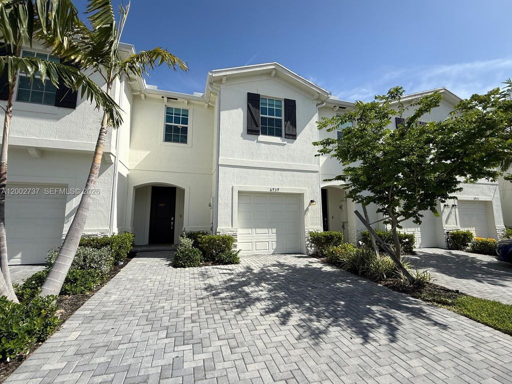 Photo of 6939 Harbours Edge Ave #6939, Lake Worth, FL 33467 (MLS # A12002737)