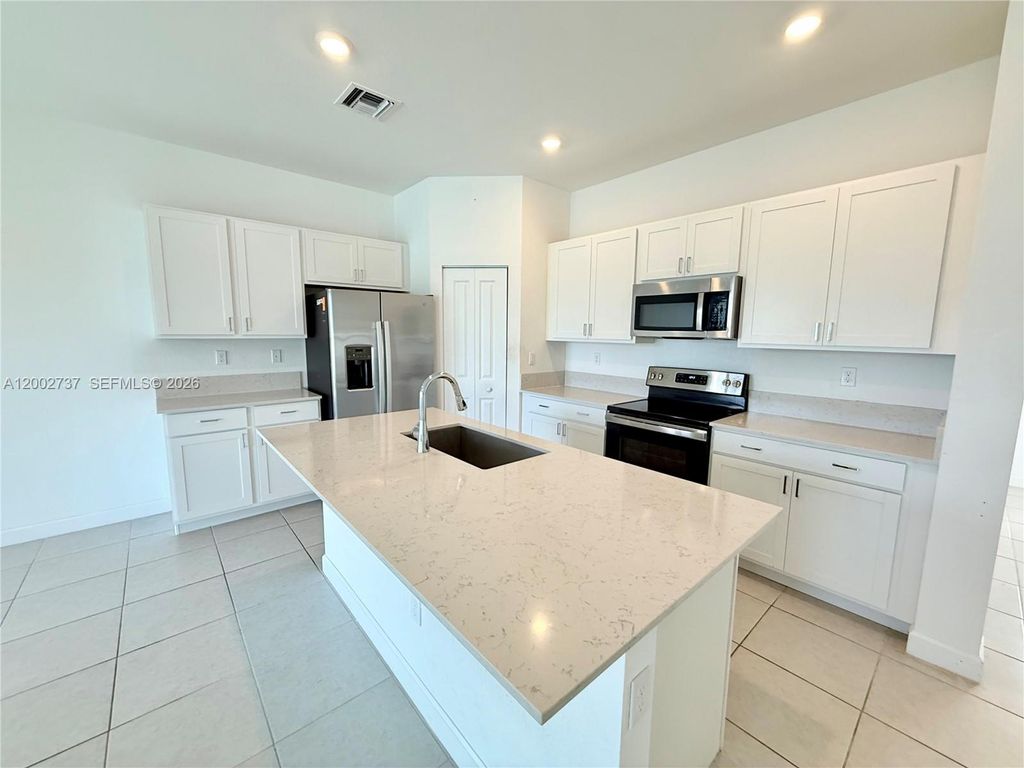 Photo of 6939 Harbours Edge Ave #6939, Lake Worth, FL 33467 (MLS # A12002737)