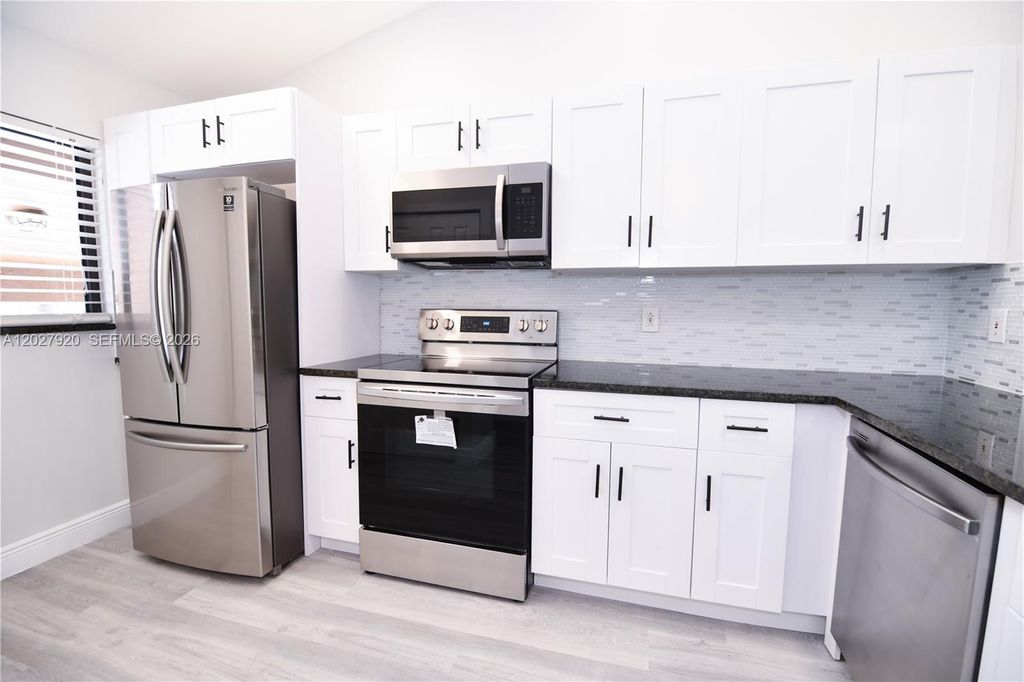 Photo of 2315 SW 22nd Ave #2020, Delray Beach, FL 33445 (MLS # A12027920)