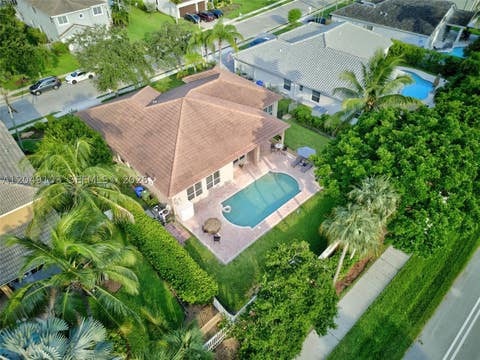 Photo of 744 SW 159th Ln, Pembroke Pines, FL 33027 (MLS # A12049103)