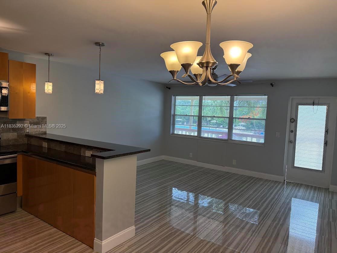 ABSOLUTELY BEAUTIFUL 1 BED, 1 BATH CONDO, BRIGHT, FULLY REMODELED, TILED THROUGHOUT, GRANITE KITCHEN, AND MORE....GATED 55 PLUS COMMUNITY,. IT'S LOCATED ACROSS FROM THE POOL. THIS IS A 2ND FLOOR UNIT, ONE OF THE LAUNDRY ROOMS IS NEXT DOOR TO THE UNIT. NEAR LOTS OF SHOPPING, DINING, ENTERTAINMENT AND PALM BEACH AIRPORT. The HOA INCLUDES POOL, FITNESS CENTER & BILLIARDS ROOMS, THEATER FOR ENTERTAINMENT, SHUTTLE SERVICES TO SHOPPING AND DINING AND BASIC CABLE.