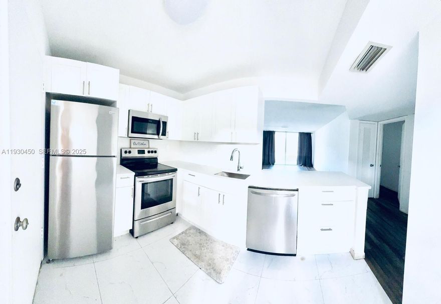 Beautifully updated open-counter kitchen design! Spacious 1-bedroom, 1.5-bath apartment in the heart of North Miami Beach. This bright and airy unit features stainless steel appliances, wood floors, a large bedroom with ample closet space, and an open balcony. Excellent location just a short walk to local shops and restaurants, and minutes from Aventura Mall and the beaches. Call today to schedule a showing!