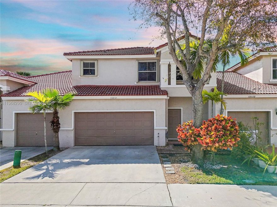 Discover this beautiful lakefront 3-bedroom, 2.5 bathroom, 2 car garage townhouse in the highly sought after gated community of Lowells Landing in Pembroke Falls. This property features an upgraded kitchen with stainless steel appliances, granite countertops, wood cabinets & bright eat-in-kitchen. There are tile floors throughout and upgraded 1/2 bathroom. All bedrooms are located on the second floor. Enjoy your private tiled patio in your backyard oasis overlooking the tranquil lake.  Community amenities include a pool, security gate with call box and lawn care for both the front and back yard. Lowells Landing is a peaceful, well-kept community and is close to shopping, dining, parks and major highways.