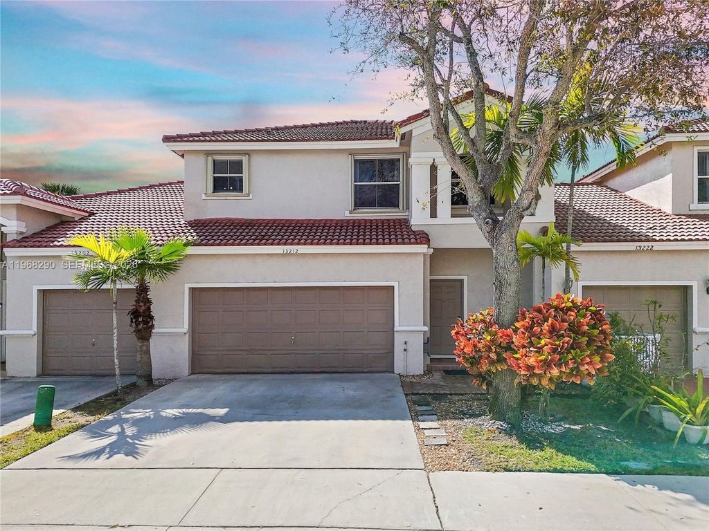 Photo of 13212 NW 8th St, Pembroke Pines, FL 33028 (MLS # A11968290)