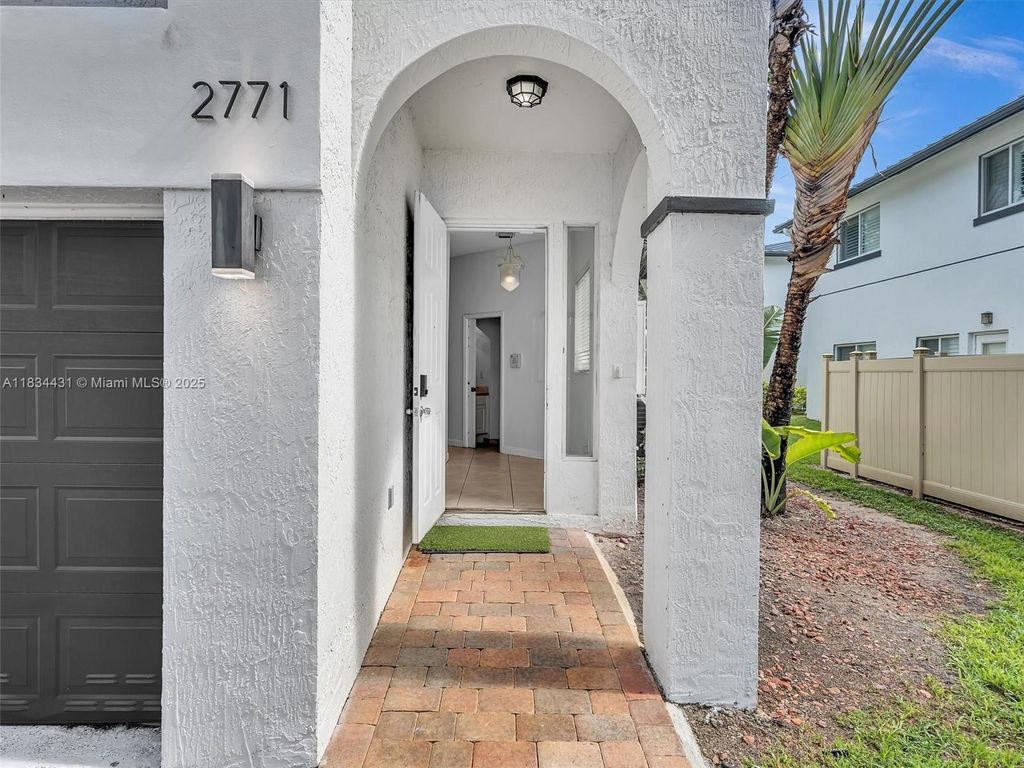 Photo of 2771 Treasure Cove Cir #2771, Dania Beach, FL 33312 (MLS # A11834431)