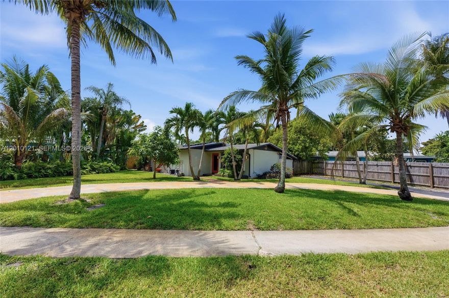 Welcome To This Stunning 3 Bed / 2 Bath Pool Home Located In The Heart Of Ft. Lauderdale On A Large Oversized Lot With No HOA! This Home Is A Rare Find Featuring A Large Driveway And A Double Gate Entrance For Boat Or RV Parking. Elegant Open Layout Boasting Rich Brazilian Cherry Wood Flooring, Recessed Lighting, And Elegant Plantation Shutters. The Heart Of The Home Is The Beautifully Updated Kitchen, Featuring Sleek Granite Countertops, A Glass Tile Backsplash, SS Appliances, A Breakfast Bar, And A Spacious Pantry For Extra Storage. The Primary Suite Is A True Retreat W/Warm Wood Floors And Private Access To The Pool Area With An Ensuite Bathroom That Is Tastefully Upgraded W/ White Shaker Cabinets, A Glass Countertop Vanity, And A Frameless Glass Enclosure Shower. Step Outside To Your Backyard Paradise Surrounded By Lavish Landscaping And Fruit-bearing Mango Trees. The Refreshing Pool Has A Salt System, Motor Pool Cleaner. Enjoy Serene Garden & Pool Views From Every Angle. This Outdoor Space Is Fully Equipped For Sustainable Living With A Chicken Coop And Storage Shed. Peace Of Mind Is Guaranteed With A Private Safe Room Closet, Impact Windows, Front Accordion Protection, A 2023 AC System, Tankless Hot Water Heater, Upgraded Electrical Panel, And A Reliable 10-Year-Old Roof. Solar Panels For Low Electric Bill. Centrally Located And Move-in Ready, This Home Offers The Best Of South Florida Living. Close To Shopping, Highways, & Beaches. Schedule Your Showings Today!