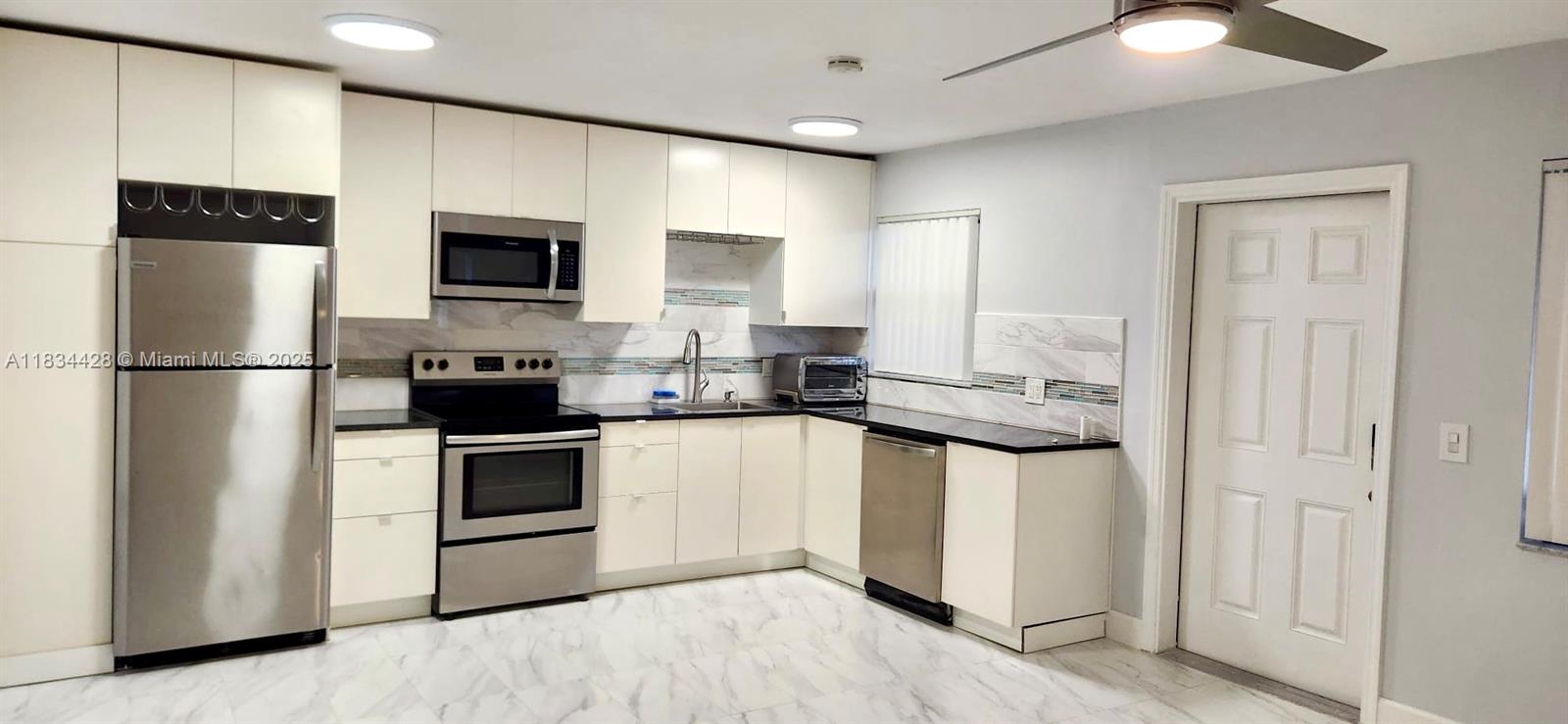harming 1BD/1BA ground-floor unit just steps from Lake Worth Lagoon! Recently renovated with modern kitchen, stainless steel appliances, ceramic floors, and fresh paint. Located in a quiet 4-plex building with 1 assigned parking space. Laundry facility onsite. Perfect for boat lovers – walk to public boat ramp, kayak or paddleboard on ICW. Only minutes to the beach, downtown shops, and dining! First, last & security deposit required. Rapid approval. Easy to show!