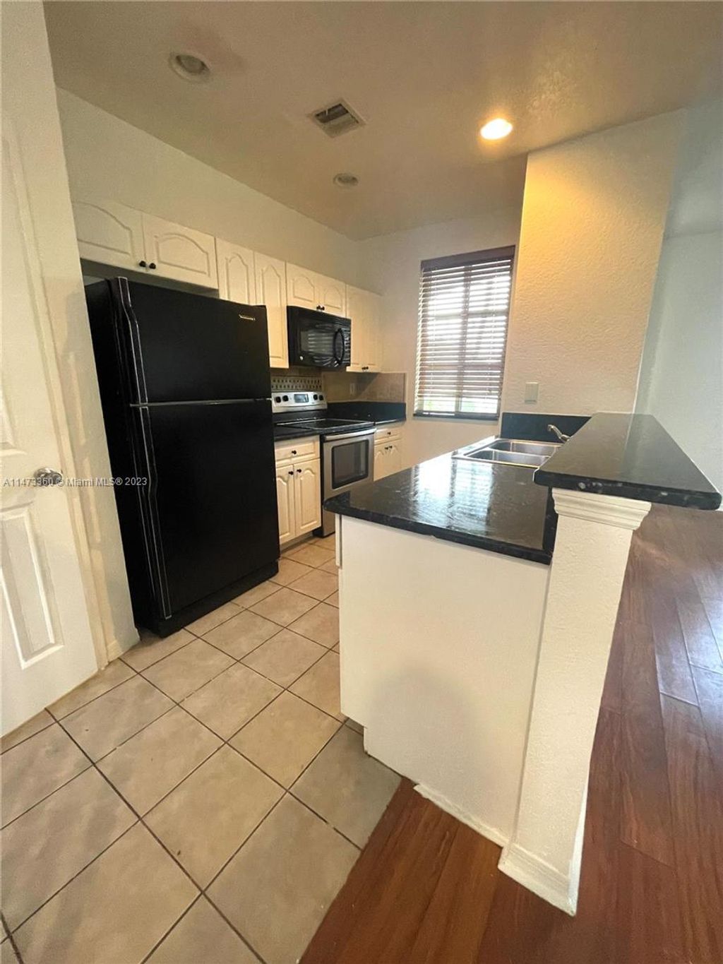 Photo of 6056 SW 19th Pl #6056, North Lauderdale, FL 33068 (MLS # A11473360)