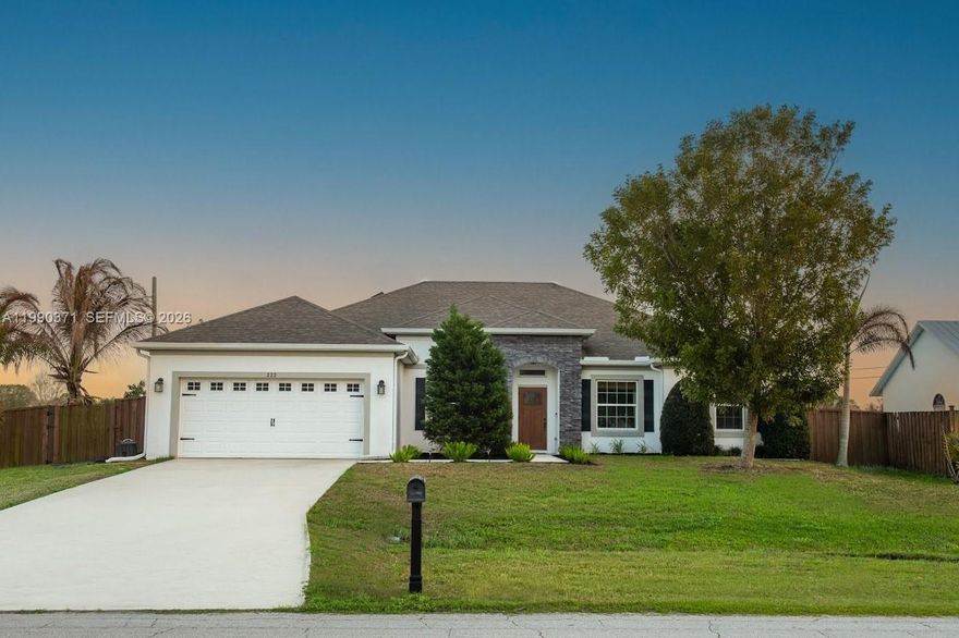 SELLER OFFERING TO CONTRIBUTE $8,000 CREDIT TOWARDS BUYER'S CLOSING COSTS. Exquisite turn-key 4-bed, 3-bath home offering 2,338 square feet of thoughtfully designed and meticulously maintained living space. Built in 2017 and set on a spacious corner lot of more than a quarter acre with no HOA, this property stands apart from typical cookie-cutter new builds with its character, style, and high-quality finishes.

Step inside to soaring high ceilings and a bright open-concept layout that seamlessly connects the main living areas. A private front office with elegant French doors provides an excellent work-from-home setup, while the formal dining room is ready to host gatherings of any size.

The gourmet kitchen serves as the heart of the home, equipped with stainless steel appliances, granite countertops, and generous prep and storage areas. The primary suite provides a comfortable escape, highlighted by a large walk-in closet with custom built-ins.

Enjoy outdoor living in the fenced backyard, featuring a covered screened-in patio and mature fruit trees (including coconut, avocado, and mango). Both the roof and HVAC are in great condition, adding valuable peace of mind.

Ideally located just minutes from the Turnpike, I-95, shopping, and dining, this home delivers a great balance of convenience and privacy.

This is a rare opportunity to own a well-maintained property that truly stands apart from the rest.
