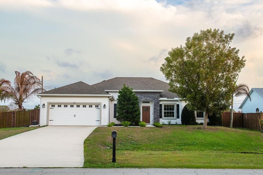 Exquisite turn-key 4-bed, 3-bath home offering 2,338 square feet of thoughtfully designed and meticulously maintained living space. Built in 2017 and set on a spacious corner lot of more than a quarter acre with no HOA, this property stands apart from typical cookie-cutter new builds with its character, style, and high-quality finishes.

Step inside to soaring high ceilings and a bright open-concept layout that seamlessly connects the main living areas. A private front office with elegant French doors provides an excellent work-from-home setup, while the formal dining room is ready to host gatherings of any size.

The gourmet kitchen serves as the heart of the home, equipped with stainless steel appliances, granite countertops, and generous prep and storage areas. The primary suite provides a comfortable escape, highlighted by a large walk-in closet with custom built-ins.

Enjoy outdoor living in the fenced backyard, featuring a covered screened-in patio and mature fruit trees (including coconut, avocado, and mango). Both the roof and HVAC are in great condition, adding valuable peace of mind.

Ideally located just minutes from the Turnpike, I-95, shopping, and dining, this home delivers a great balance of convenience and privacy.

This is a rare opportunity to own a well-maintained property that truly stands apart from the rest.