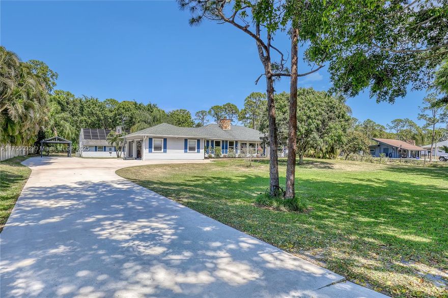 Amazing 1.25 acre property with three buildings encompassing 4484sf.  The completely fenced property with a large screened pool in excellent shape.  The four bed, 3 bath home of almost 2732sf under air.  Your imagination will run wild with the 2-story 2nd bldg.  Possible n-law arrangement or guest house?  Or is it a workshop?  Run your business here.  And for her, we have a "she shack".  So many possibilities.  NOW! Huge Price Reduction.  And a special below market interest rate is possible.  Let's talk terms.