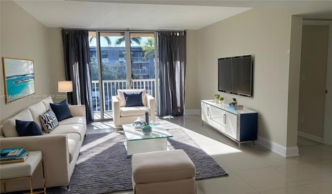 Photo of 1350 SE 3rd Ave #309, Dania Beach, FL 33004 (MLS # A11813385)