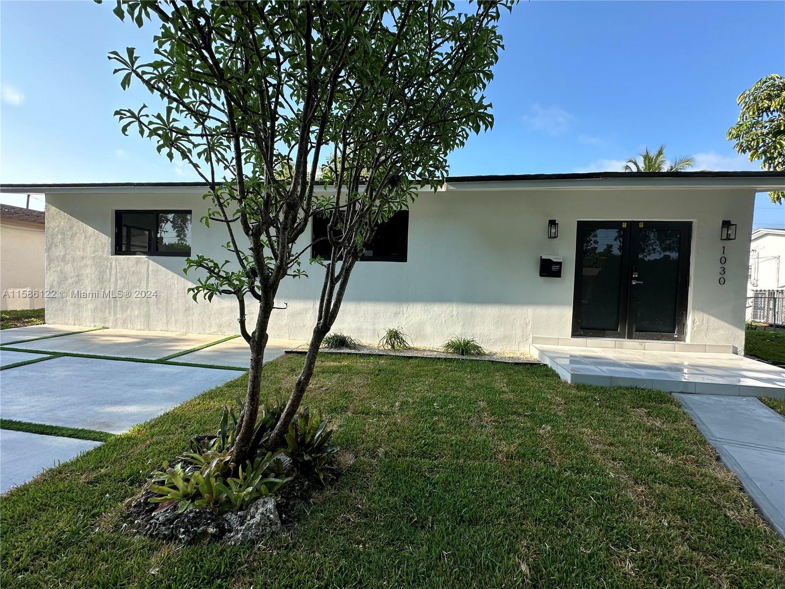 1030 Nw 57th St St, Miami, Broward County, Florida - 3 Bedrooms  
3 Bathrooms - 