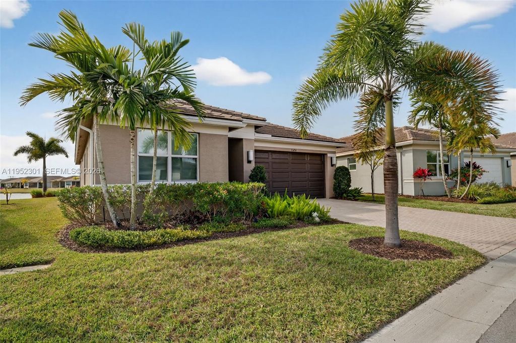 Photo of 11694 SW River Crossing Pl, Port St Lucie, FL 34987 (MLS # A11952301)