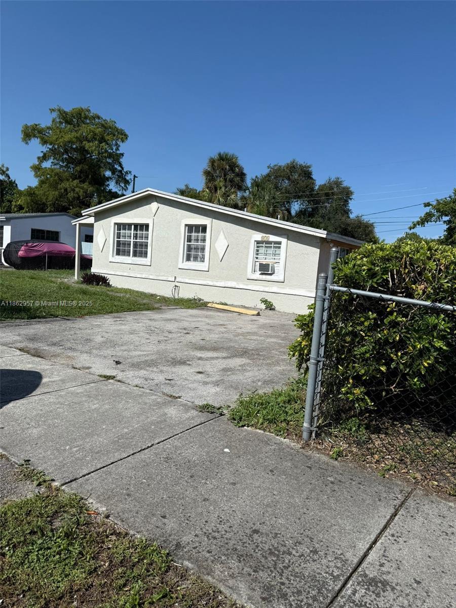 This charming 3 bedroom, 1 bathroom home features tile flooring throughout and has been freshly painted inside and out, offering a bright and modern look. The updated kitchen boasts granite countertops, perfect for cooking and entertaining.
Enjoy the spacious large backyard, ideal for outdoor activities, plus plenty of parking for your vehicles and guests. Conveniently located near I-95 and the Florida Turnpike, this home offers easy access to shopping, dining, and major highways.