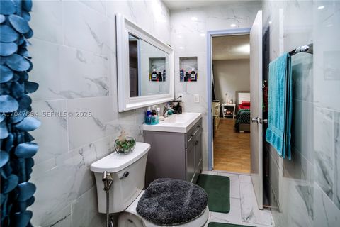 Tiny photo for 10815 NW 26th St, Sunrise, FL 33322 (MLS # A12047894)