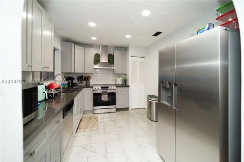 Tiny photo for 10815 NW 26th St, Sunrise, FL 33322 (MLS # A12047894)