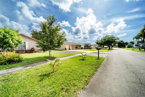 Tiny photo for 10815 NW 26th St, Sunrise, FL 33322 (MLS # A12047894)