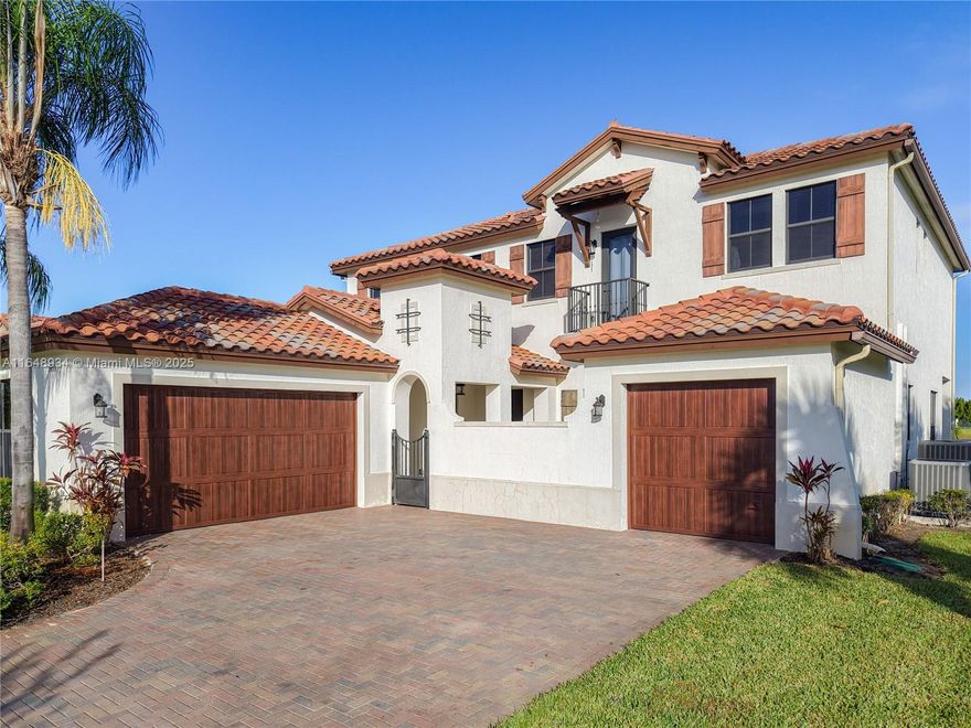 Spectacular corner home on the lake, only an hour and a half from Miami, featuring 5 bedroom and 4 and a half
bath, an additional and totally private in law quarter for extra privacy or extra income, impact windows on second floor, sprinklers system originally installed by developer, master bathroom with his and hers sinks , shower and roman tub, 3 car garage, ready to move in !,The location of this house is key, close to both community exits, and you can walk to the clubhouse, low HOA includes cable and many amenities such as pool, gym, clubhouse, water park, furniture is negotiable, come see your dream home today!