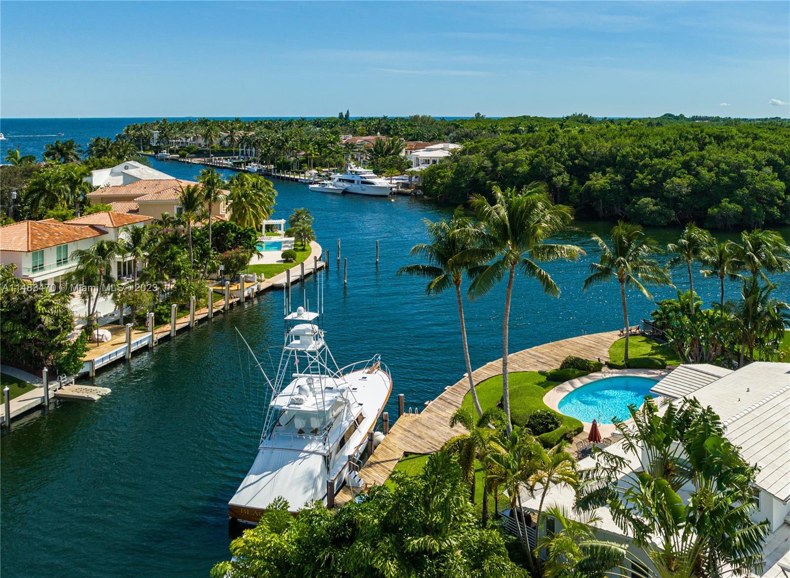 Experience the best in waterfront living-- Exclusive luxury waterfront redevelopment opportunity in gated enclave of Sunrise Harbour.
Uniquely positioned at the end of the Cul-de-Sac, 6941 Sunrise Court offers panoramic waterway and bay views while ensuring privacy-- 17,300 SF Lot, Ideal to build a bespoke residence or renovate existing home.
With over 174FT of prime waterfront with secure docking for 100+ FT Yacht. A yacht enthusiast’s dream in the heart of the city, Sunrise Harbour is the neighborhood for those in the know. Prime Deep water location right on the Gables Waterway where the Grove meets the Gables— Residents are steps from top schools in the state, bistros, boutiques and luxury shopping of Cocowalk, Merrick Park and beyond.
Your slice of paradise awaits.