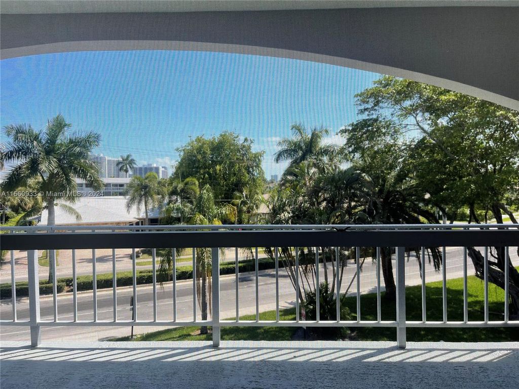 Photo of 501 Blue Heron Dr #318-A, Hallandale Beach, FL 33009 (MLS # A11560933)