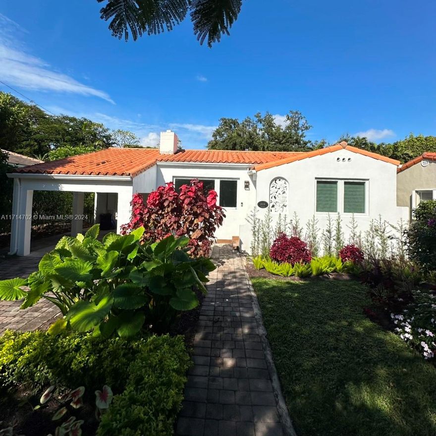 Live comfortably and luxuriously in this Coral Gables home available now! This beautiful mid century home surrounded by lavish landscaping holds new impact windows, updated appliances, a fully renovated bathroom, and much more. The house is perfectly located minutes away from the heart of Coral Gables, Coconut Grove, Brickell, Downtown Miami, and Miami Beach.  The original fireplace and hardwood floors show the homes charm and its numerous windows give the home ample natural light.  Finally, the open backyard allows plenty of space for entertaining, hosting, and relaxing.