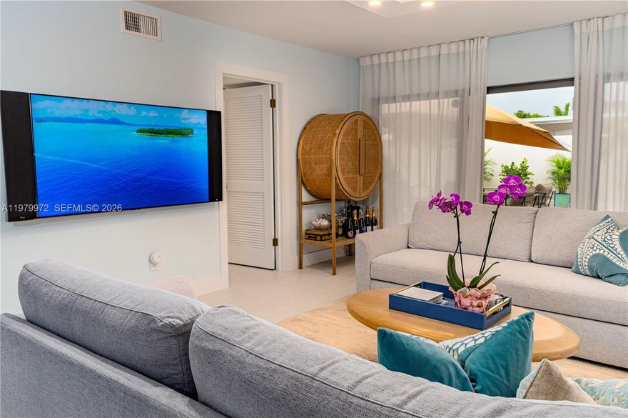 Beautifully renovated penthouse unit featuring two spacious private rooftop terraces. The unit has been completely remodeled with high-end finishes, including granite countertops, stainless steel appliances, custom kitchen cabinetry, and neutral-tone tile flooring throughout. The property is equipped with a 2.5-ton A/C system and impact windows and sliding glass doors.

The unit includes four parking spaces, two of which are underground covered spaces deeded to the unit. Enjoy two large private patio decks: a North terrace of approximately 900 sq. ft. and a South terrace of approximately 600 sq. ft., offering exceptional outdoor living space.

Conveniently located within walking distance to the movies shops, dining, and attractions of Coconut Grove. No assessments. A+ school district.