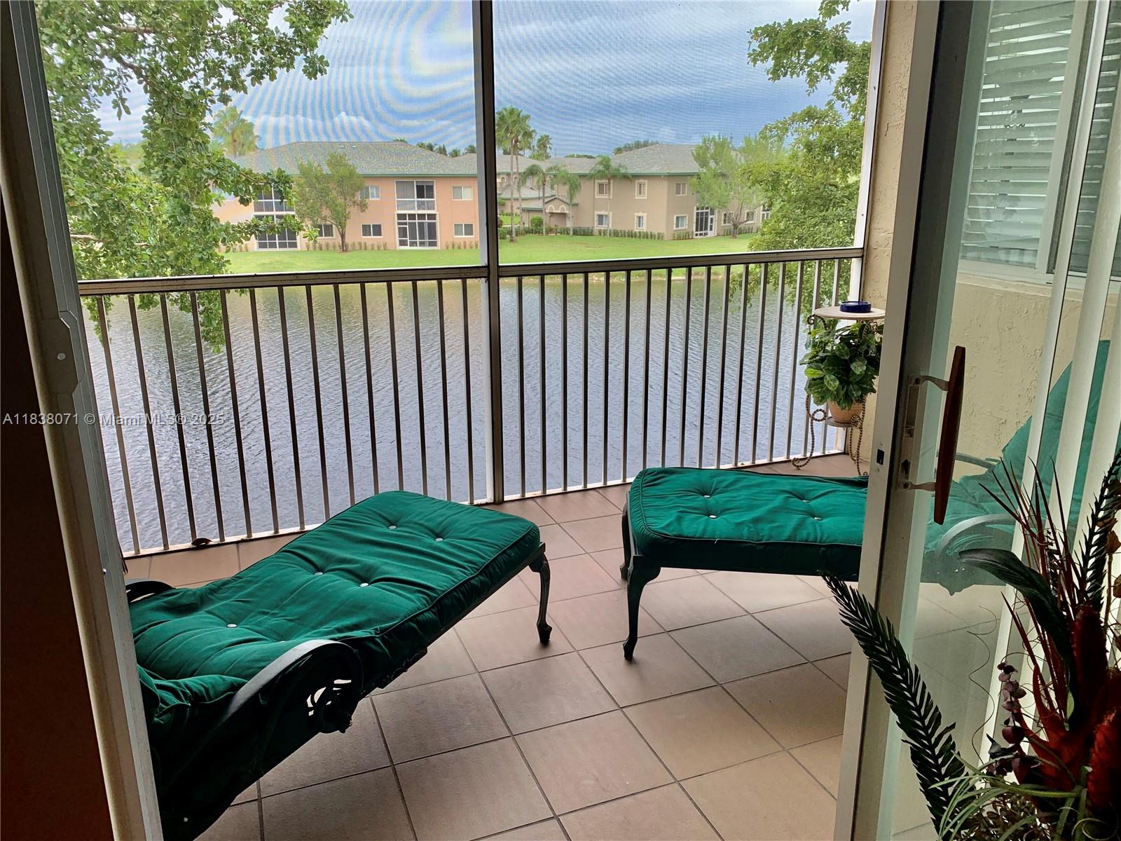 Very spacious 2-bedroom, 2-bath condo with stunning lake views! This beautifully maintained home features a huge open kitchen, in-unit washer and dryer, screened balcony, new A/C, tankless water heater, and no popcorn ceilings. Located in a desirable 55+ community offering resort-style living with an impressive clubhouse, multiple pools, fitness center, tennis, pickleball, shuffleboard, over 60 clubs, a state-of-the-art theater, courtesy buses, and 24-hour guarded gate. Easy to show with 24 hours’ notice. Conveniently located to Ft.Lauderdale beaches, airport, shopping and highways.